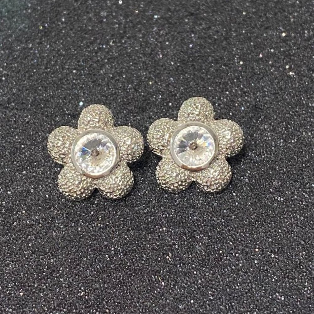 Textured silver large flower stud earrings